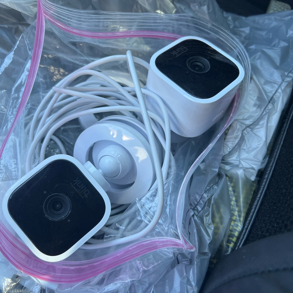 2 White Blink Mini Security Cameras